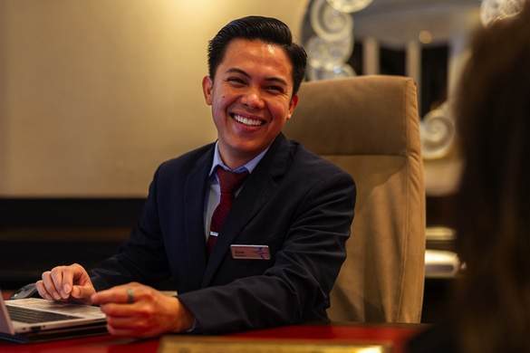 Oceania Cruises Insignia Reception staff.jpg